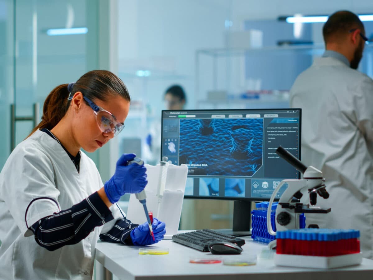 Scientist analyzing data on computer